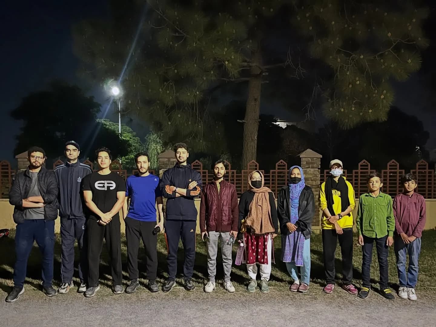 Wah Run Club members together outdoors after a community run at night