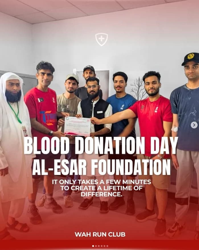 Wah Run Club members with Al Esaar Foundation representatives at a blood donation drive